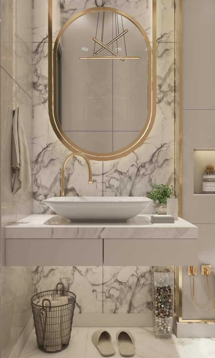 Marble bathroom with brushed gold fittings and freestanding basin